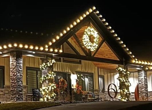Norfolk house with professional christmas wreaths and garland